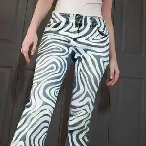 70s Disco groove inspired mid rise light washed bootcut jeans with waves pattern